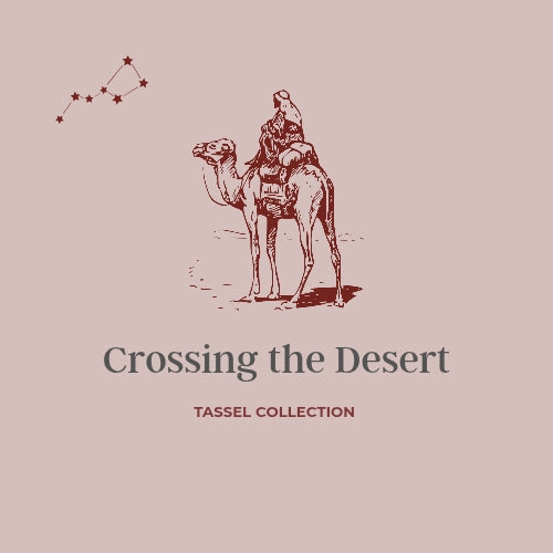 Tassel necklaces with Moroccan filigree wood and silk accent displayed together.