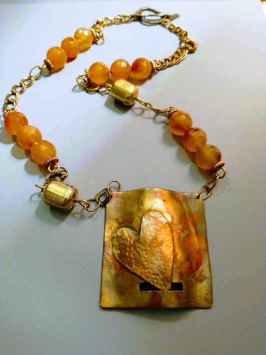 Heart-shaped flame-painted copper necklace with faceted Carnelian beads by SOUFiiARTe