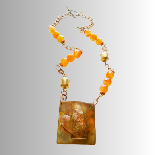 Heart-shaped flame-painted copper necklace with faceted Carnelian beads by SOUFiiARTe