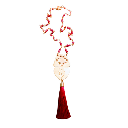 Pink glass and brass pendant necklace with fuchsia tassel and Quatrefoil SoufiiArte Hidden Signature Clasp from the Marrakesh Collection.
