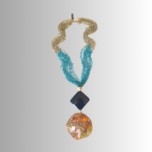 Brass sand dollar pendant necklace with black faceted onyx and layered turquoise-brass multi-chain, handcrafted by SOUFiiARTe