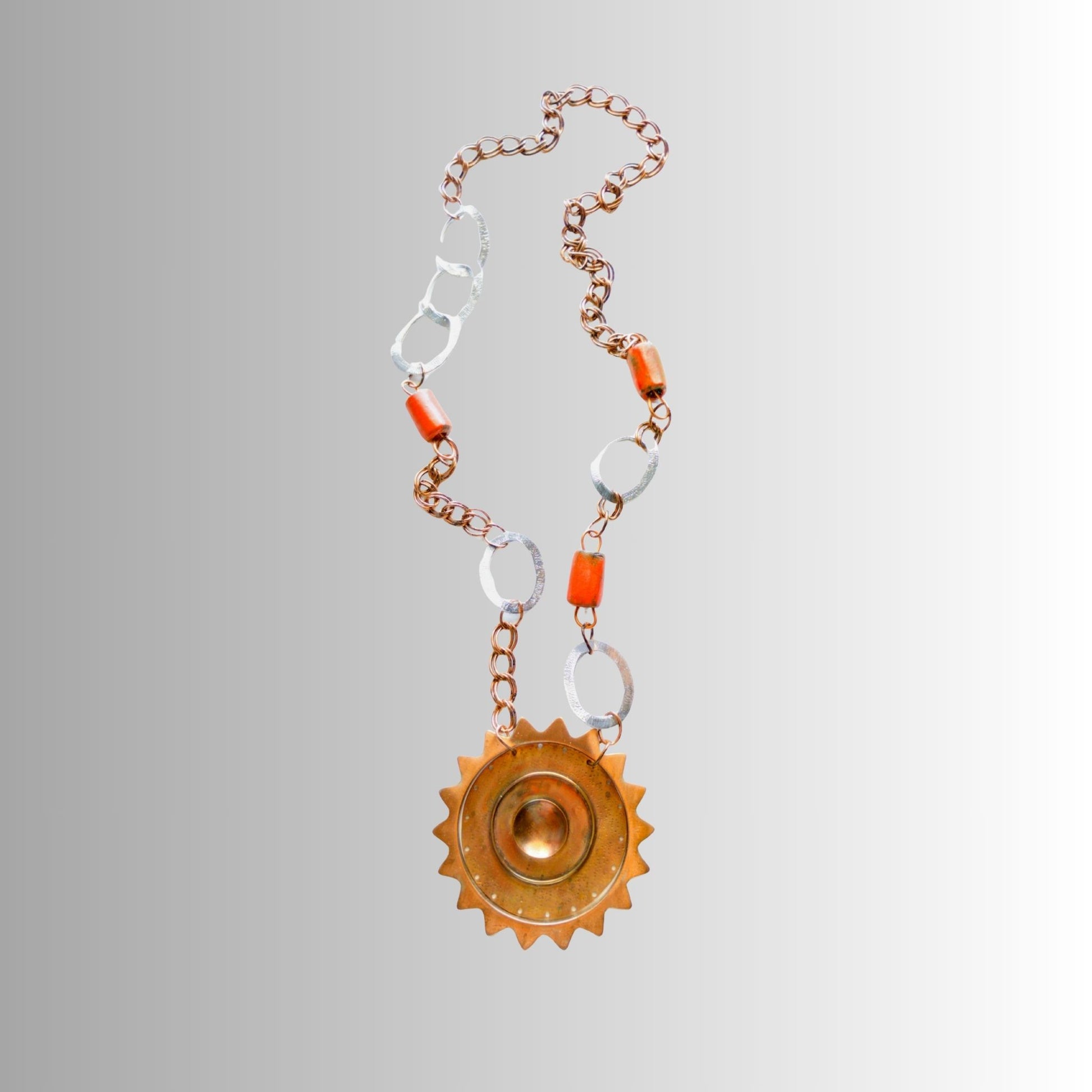 Solar eclipse-themed ceramic bead necklace featuring a central moonphase pendant, artisan-made by SOUFiiARTe