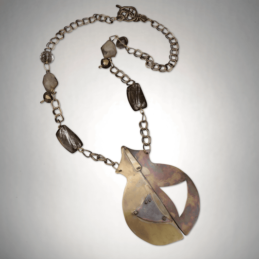 Brass time capsule-inspired pendant necklace with beige fashion beads, handcrafted by SOUFiiARTe