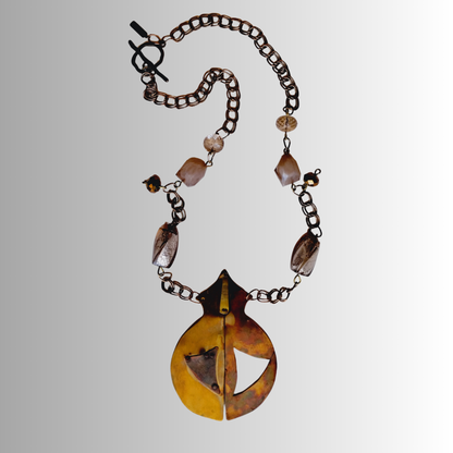 Time Capsule Pendant Necklace with sculptural brass capsule pendant and beige fashion beads, handcrafted by 
SOUFiiARTe.